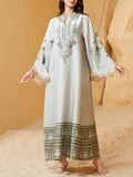 Elegant Floral Print Dress With Fringe Hem